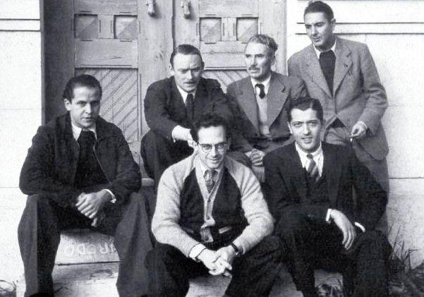 Six artists of the Secretariado de Propaganda Nacional sitting on steps, 1939